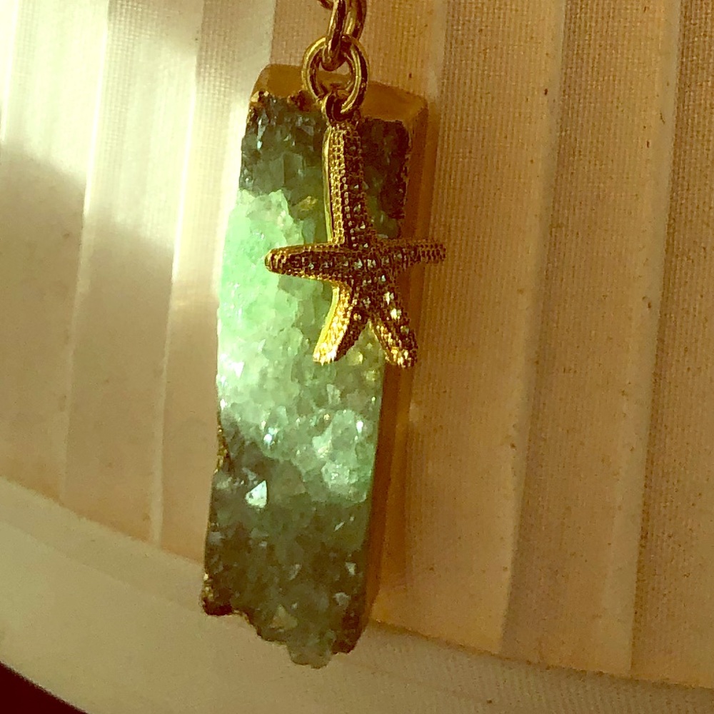 Green druzy necklace with gold sparkly star fish